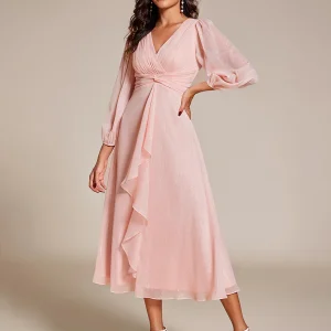 Kort klänning  med lång ärm pink