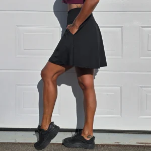 Svart Byxkjol med fickor utanpå